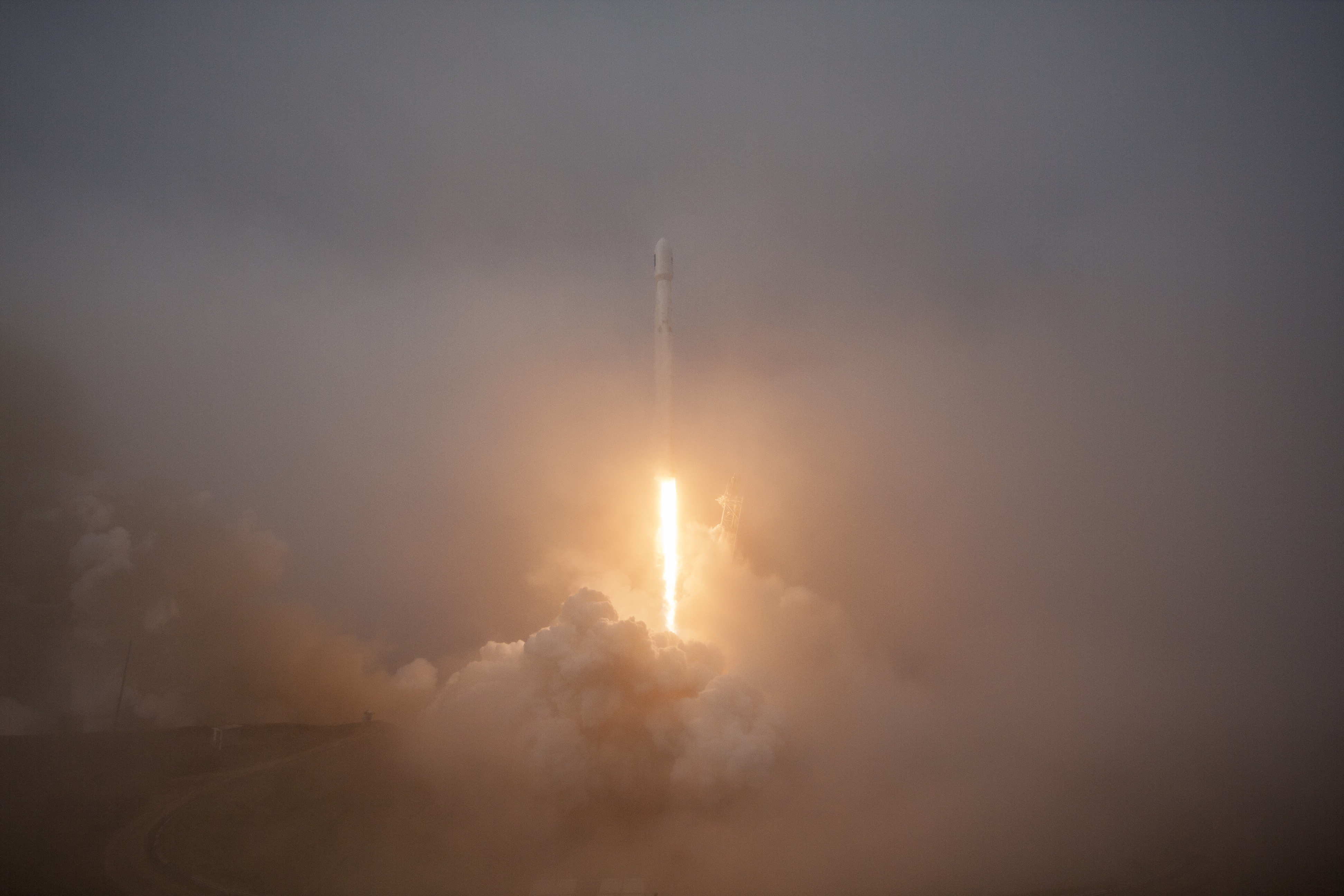 Jason-3 lifting off through heavy for from SLC-40 at Vandenberg Air Force Base